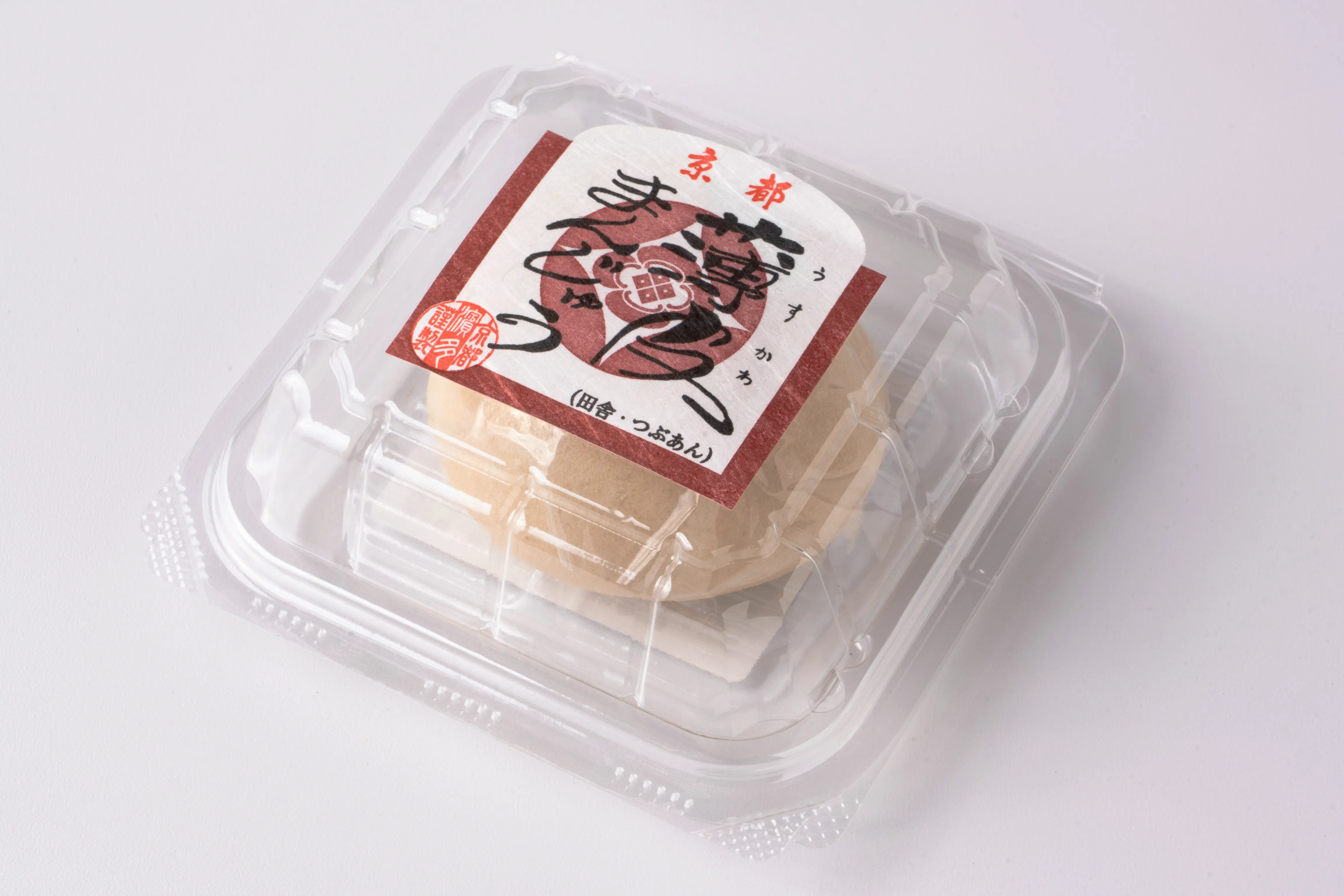赤の枠色と和紙の白を使った田舎つぶあん用のまんじゅうシール